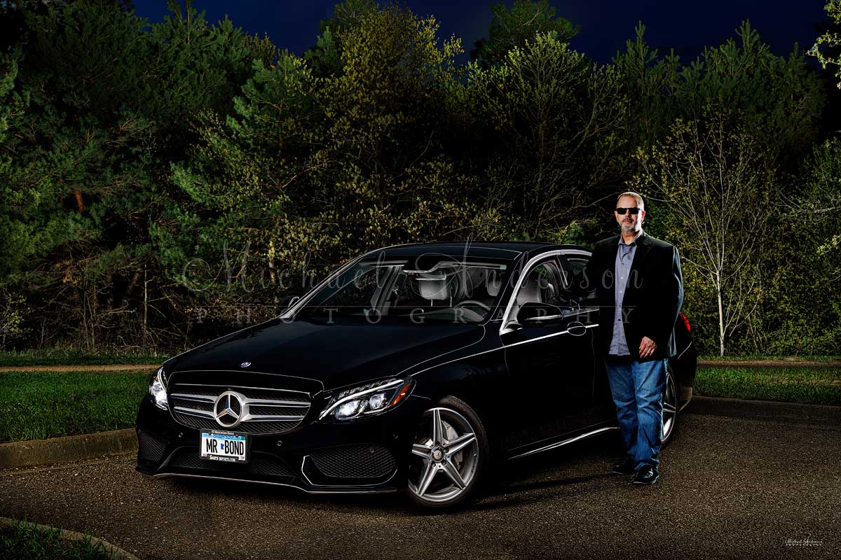 A cool light painted photo of a 2016 Mercedes Benz C300, and its owner, in a park in Coon Rapids, MN.