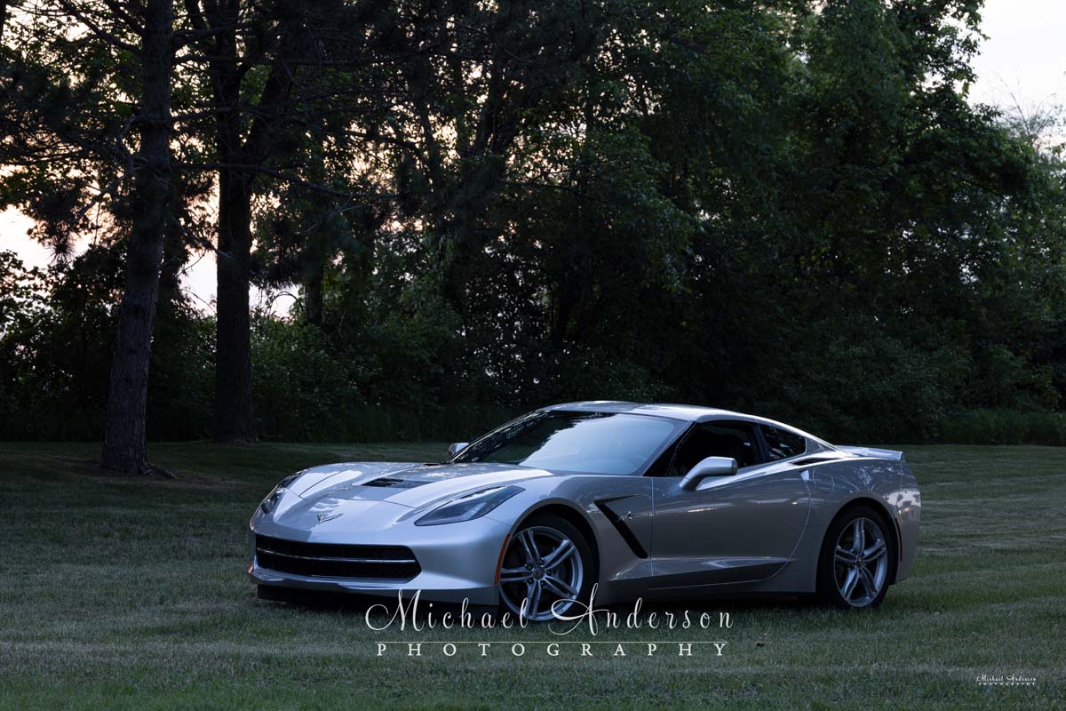 A photograph of a 2017 Chevrolet Corvette sitting in a park waiting to be light painted by Michael Anderson.