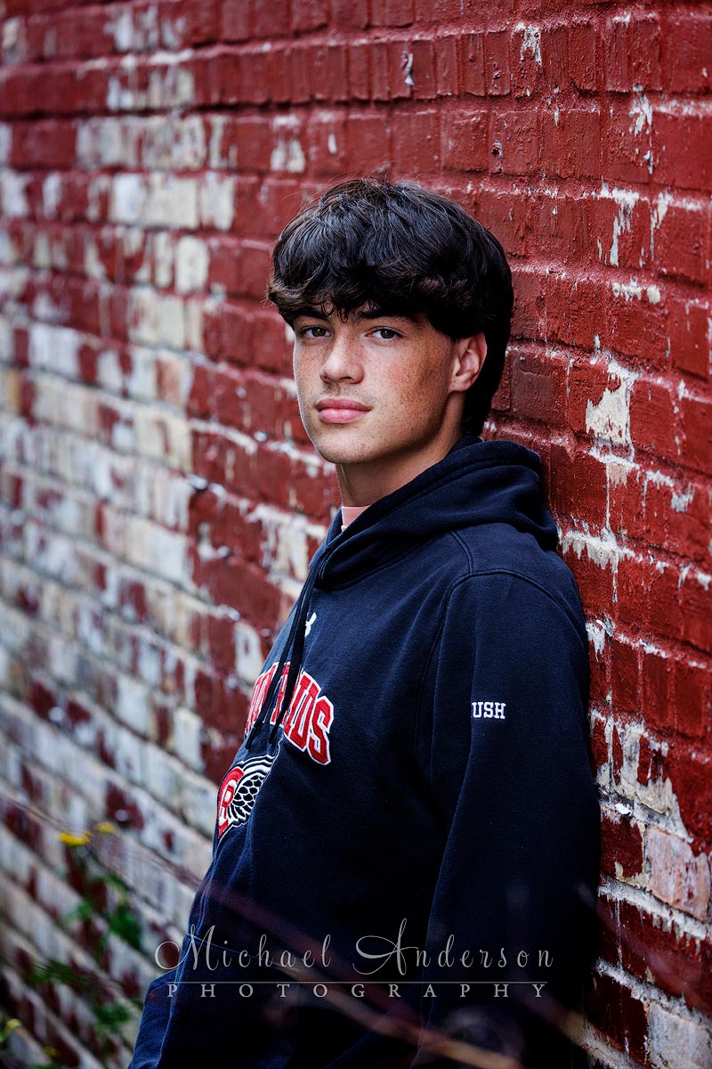 A boy poses for one of his Coon Rapids senior photos in Two Harbors, MN.