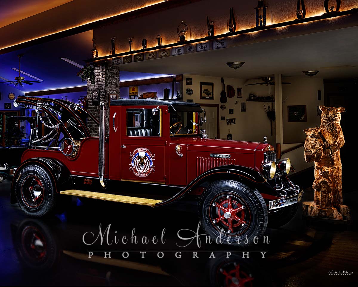 A cool light painted photo of a mint condition red 1927 International Wrecker.