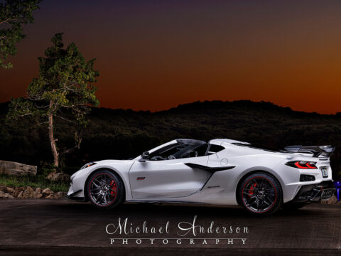 A pretty light painted photograph of a 70th Anniversary Corvette Z06.