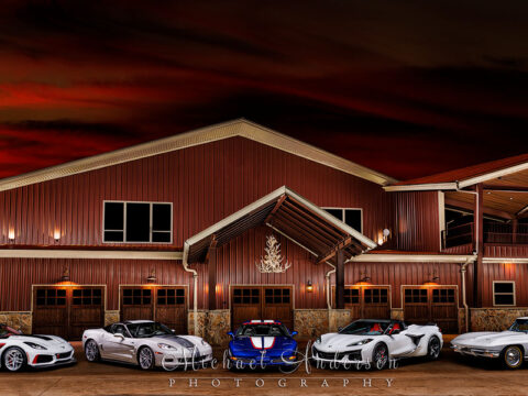 A beautiful light painting of five Corvettes at a lodge. In this one-of-a-kind-photograph features a 1966 Corvette Stingray Convertible, a 2004 Corvette C6 Z06 Leman’s Commemorative Edition, a 2013 Corvette 60th Anniversary ZR1, a 2019 Corvette ZR1, and a 2023 Corvette Z06 Convertible!