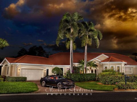 A beautiful light painted photograph of a 2024 Ford Mustang GT Performance and the client's lovey home.