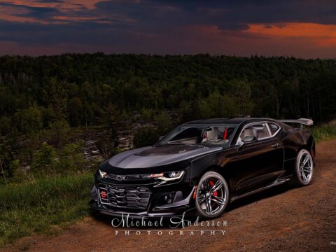 A pretty light painted photograph of a Mosaic Black Metallic 2018 ZL1 1LE Camaro in northern Minnesota.