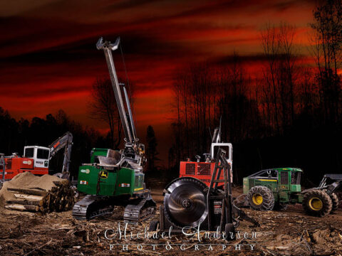 A pretty light painted photograph of four pieces of logging equipment used by Fornengo Forest Products. From left to right, there's a SERCO 300 Series Loader with a 72" SERCO Saw, a John Deere 2154G Swing Machine with a Pro Pac Delimber, a second SERCO 300 Series Loader with a 72" SERCO Saw, and a John Deere 948L-II Grapple Skidder.