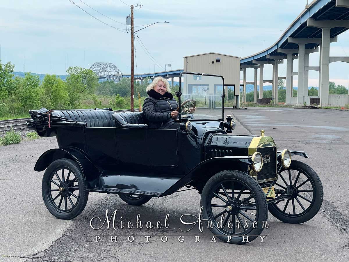 A pretty lady sitting in a 1915 Model T Ford in Superior, Wisconsin.