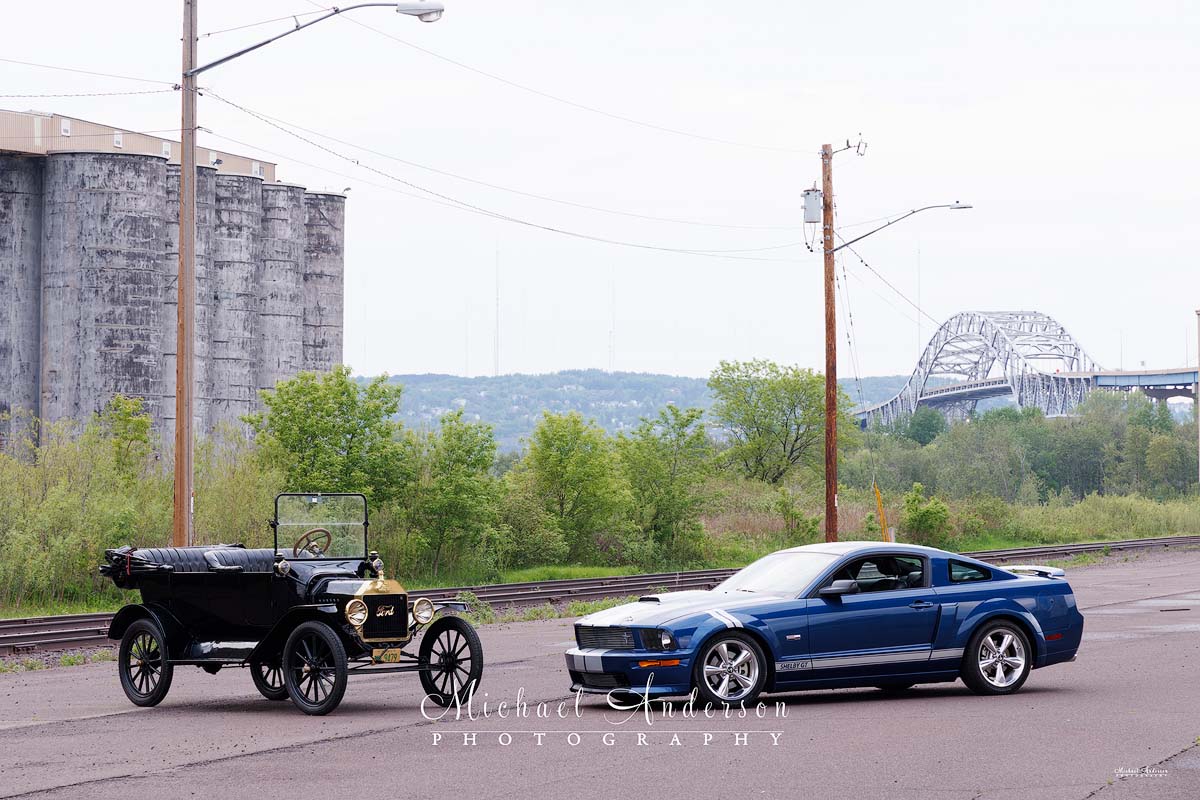 Photo of a 1915 Ford Model T and a 2008 Ford Shelby Mustang in Superior, Wisconsin.