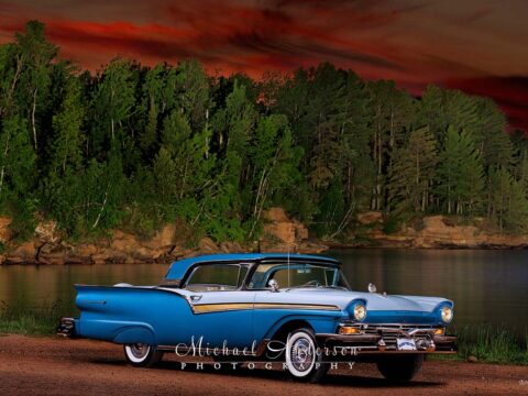 A pretty light painted photograph of a 1957 Ford Fairlane 500 Skyliner, taken from the front.