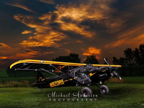 A cool light painted photograph of CubCrafters XCub N920RS.
