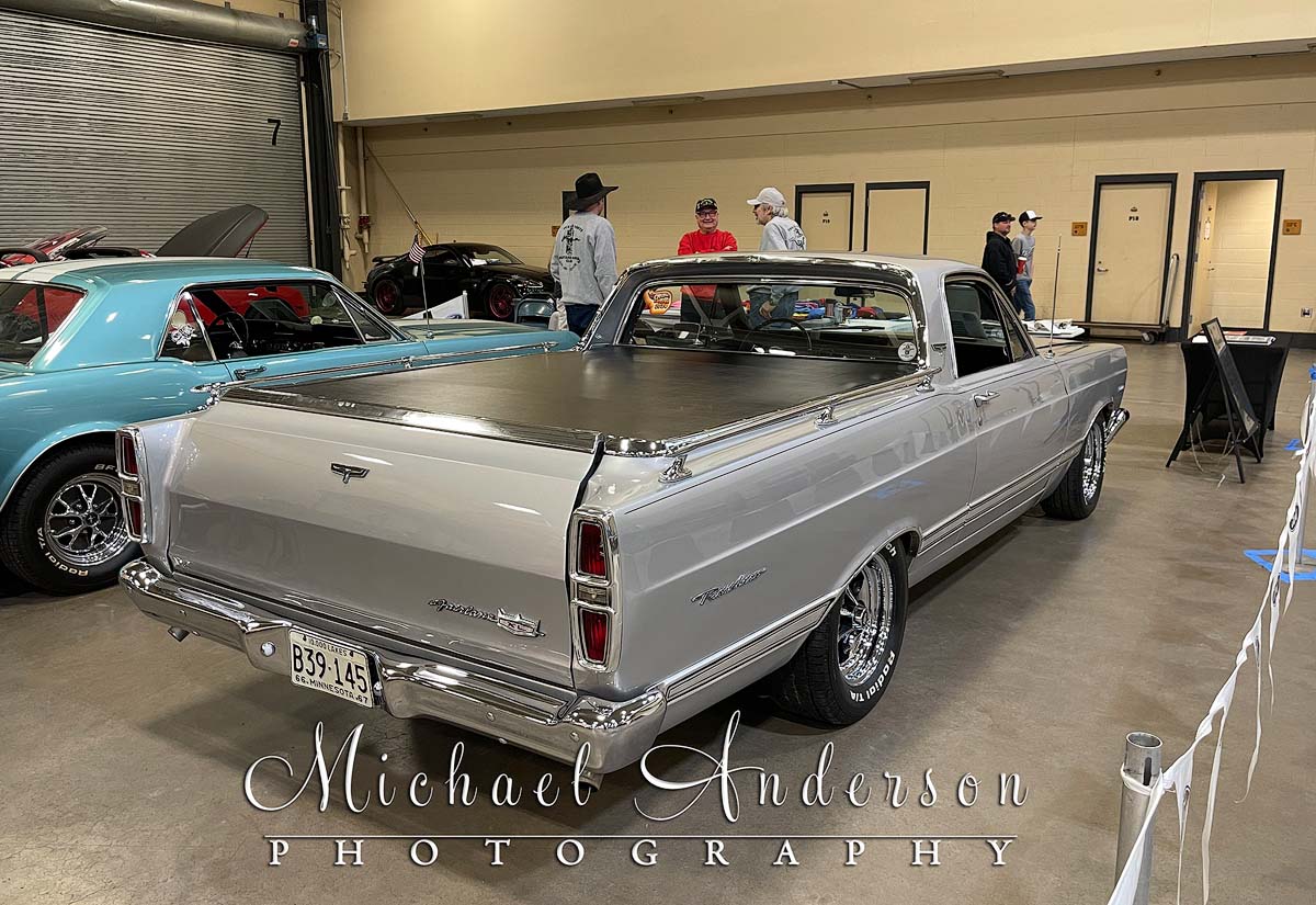 Rear-end view of a silver 1967 Ford Fairlane Ranchero at the 2025 Motorhead Madness Duluth Minnesota.