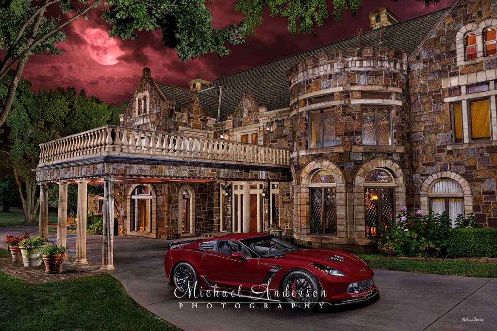 Light painted photograph of a Long Beach Red 2016 Corvette Z06 and cool mansion under a blood moon.