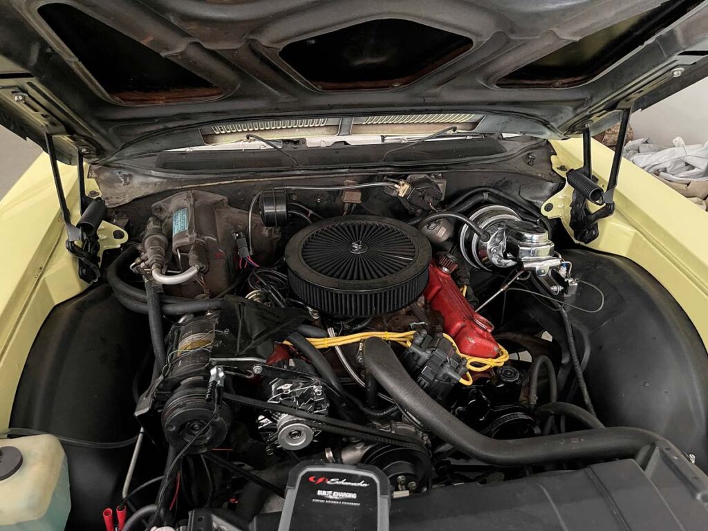 The engine compartment of a 72 Buick Skylark.