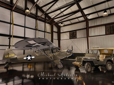 A unique light painted photograph of PIPER J3C-65 - N33579 and the Jeep.