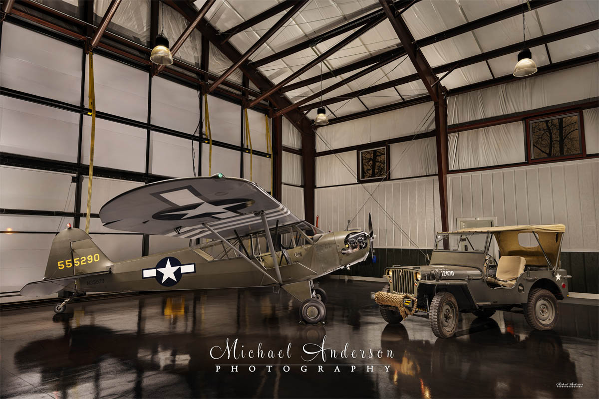 A unique light painted photograph of PIPER J3C-65 - N33579 and the Jeep.
