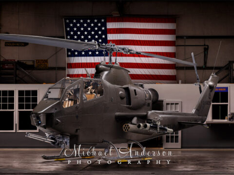 A cool patriot light painting of AH-1F Cobra N826HF in the hangar at Army Aviation Heritage Foundation & Flying Museum in Hampton, Georgia.