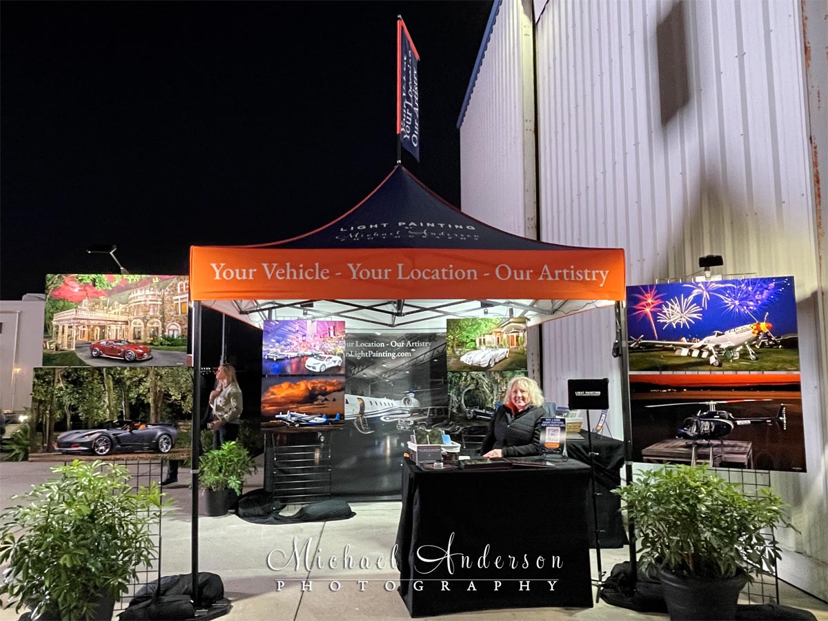 Michael Anderson Photography's light painting photography display at the 2026 Jetport Reception for the Cars on 5th Show held in Naples, Florida.