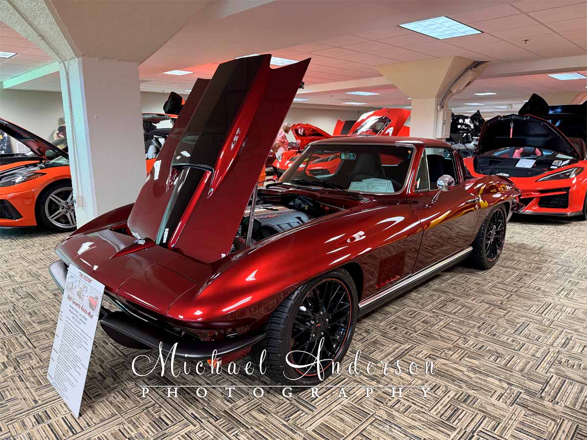 A stunning 1967 C2 Resto-Mod Coupe on display at the Lake of the Ozarks Corvette Club's "Corvettes in Paradise" show.