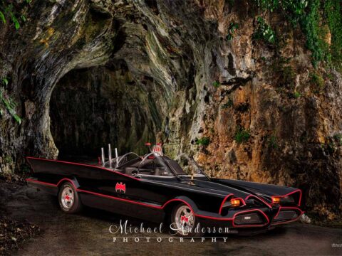 An amazing light-painted photograph of the Batmobile at the Batcave.