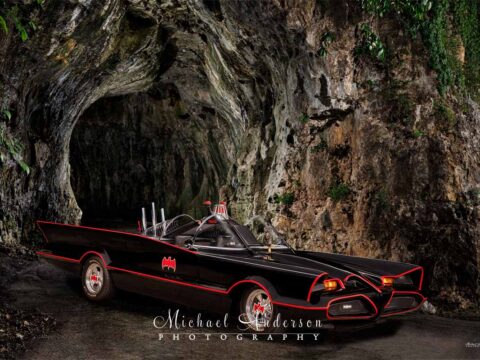 An amazing light-painted photograph of the Batmobile at the Batcave.