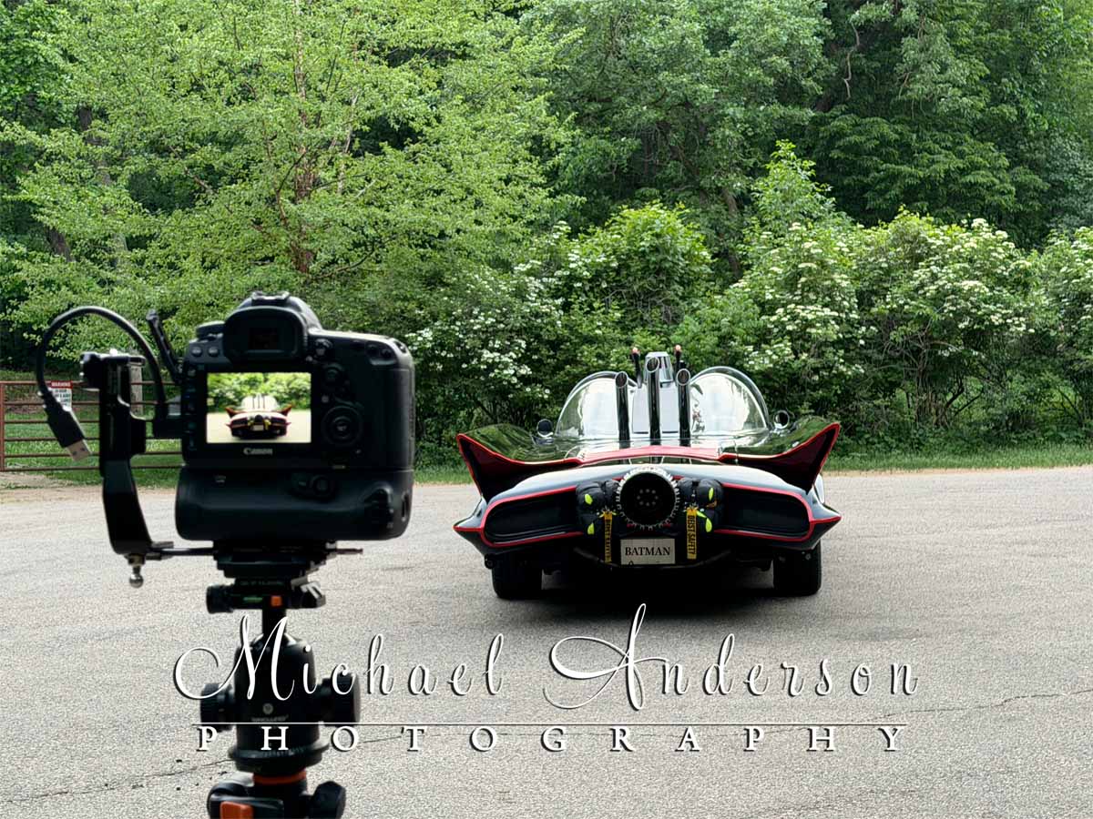 Behind-the-scenes of the rear-end of the Batmobile being light painted.