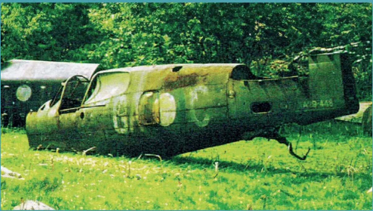 A P-40, in disrepair, as it looked in 1973, when it was discovered near an airstrip in Tadji, New Guinea.