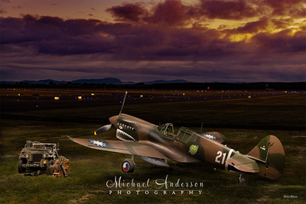 Stunning-light-painted-photograph-of-P-40-N-1-Kittyhawk-and-a-Willys-Jeep-at-Soaring-by-the-Sea-Foundation-in-Eugene-Oregon
