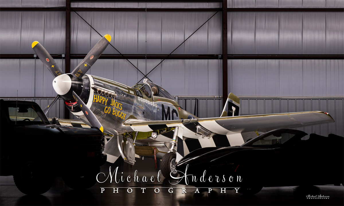A cool light painted photograph of the famous P-51 D Mustang “Happy Jack's Go Buggy”. This image was created as part of a 3-vehicle light painting at the airport in Oshkosh, WI.