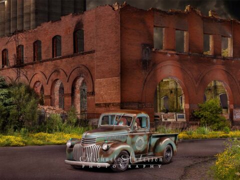 A stunning light painting of a 1941 Chevy AK pickup in front of the Twohy Mercantile Building in Superior, WI.