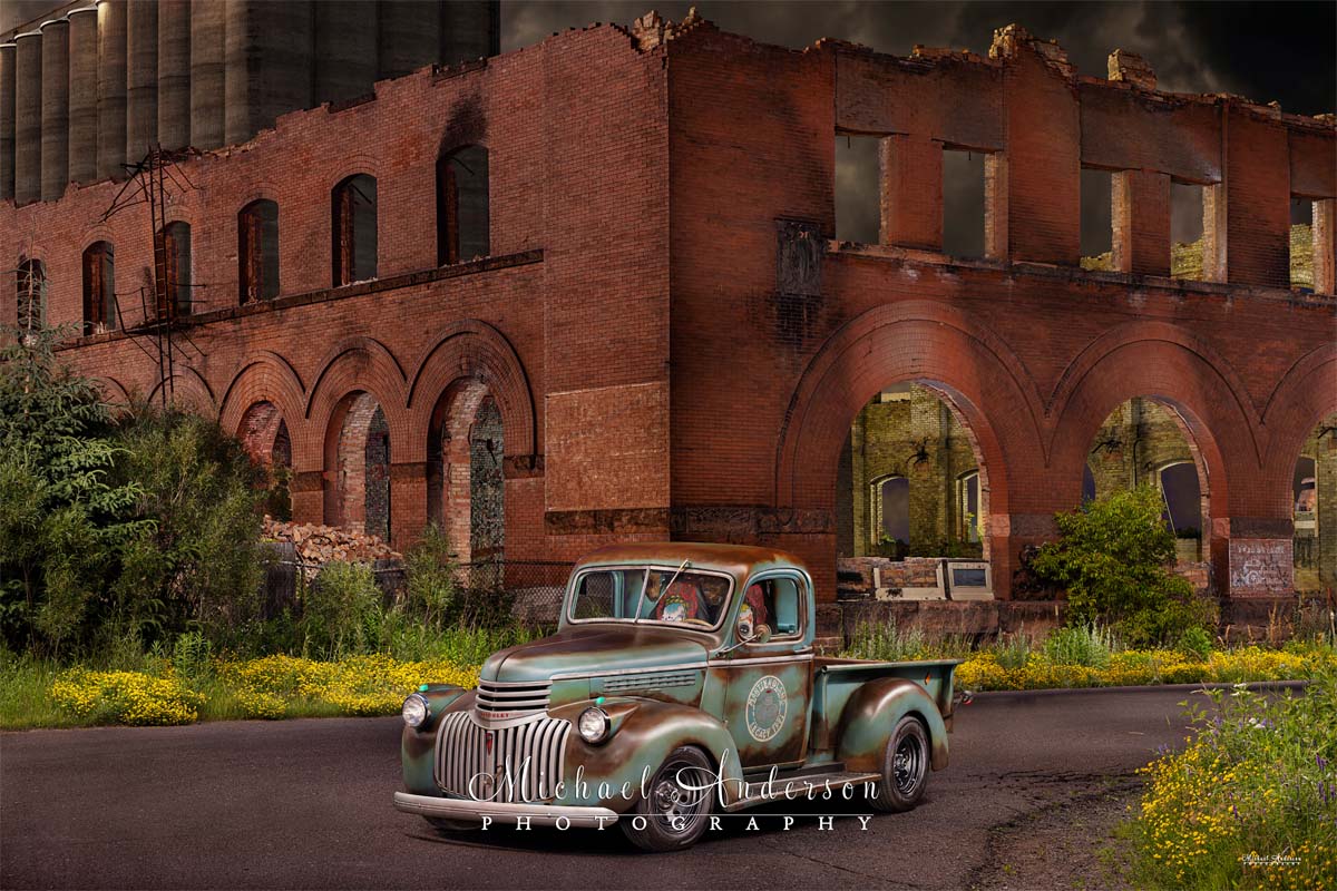A stunning light painting of a 1941 Chevy AK pickup in front of the Twohy Mercantile Building in Superior, WI.