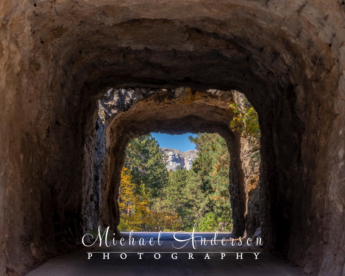 Mount Rushmore as seen through one of the Iron Mountain Road tunnels.