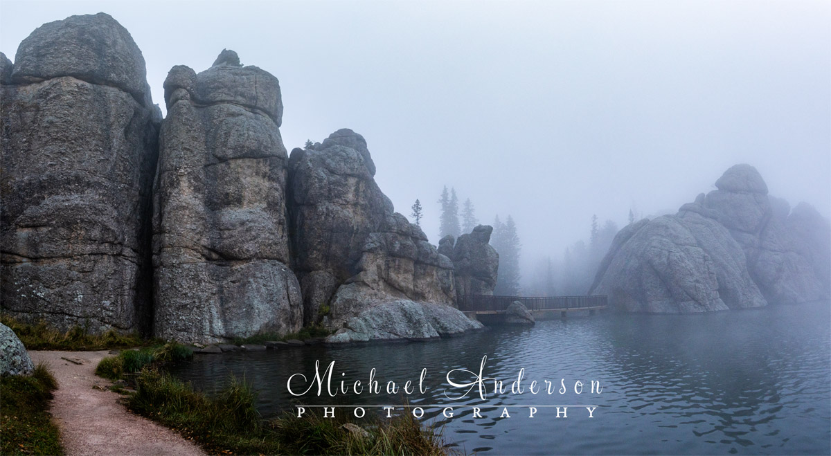 Foggy morning at the Sunday Gulch Dam on Sylvan Lake in Custer State Park.