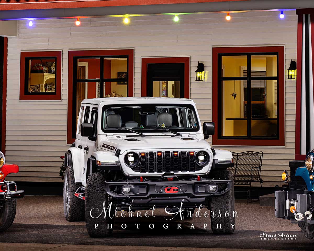 A cool ight painted photo of a white 2025 Jeep Wrangler Rubicon X.