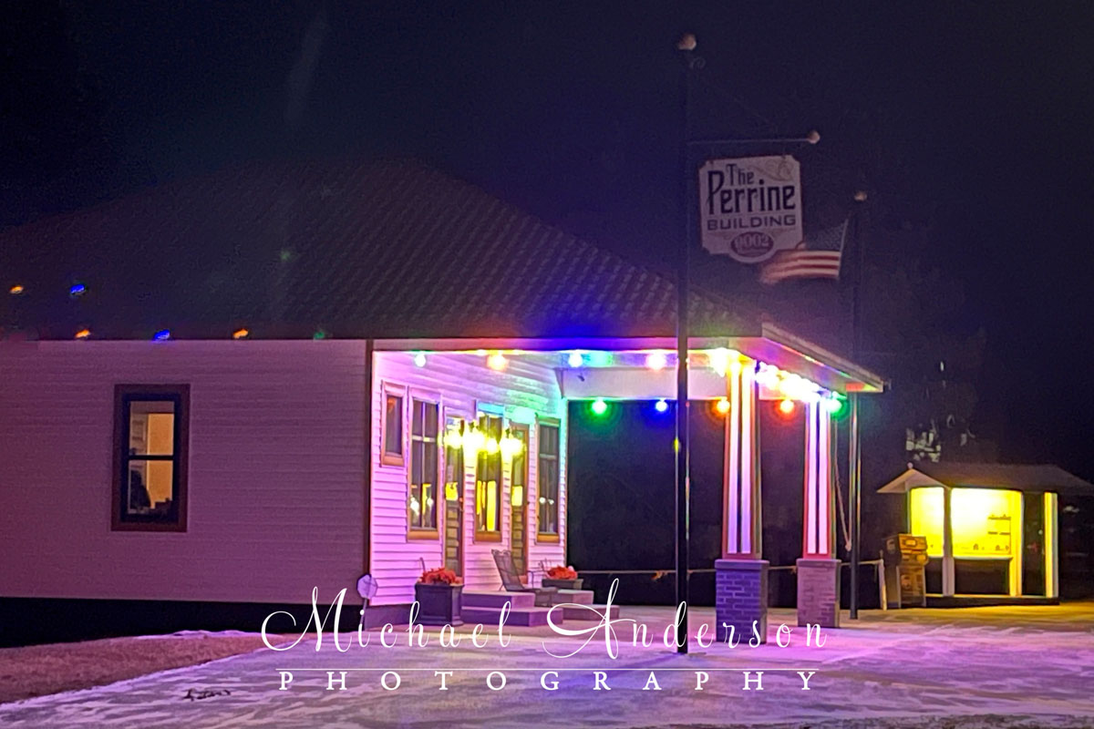 Wintertime photo of the historic Sturgeon Lake Mobile gas station (now a real estate office) in Sturgeon Lake, MN.